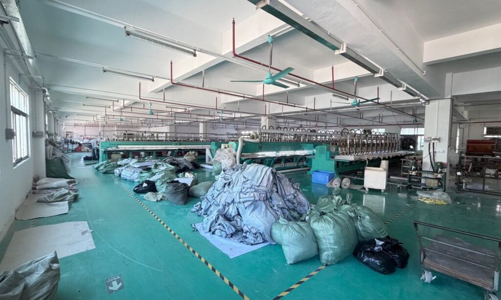 Inside PatchCraftPro 1400 sqm custom patch manufacturing factory with Tajima embroidery machines