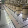 Industrial equipment producing bulk patches at a reliable custom patch manufacturer.